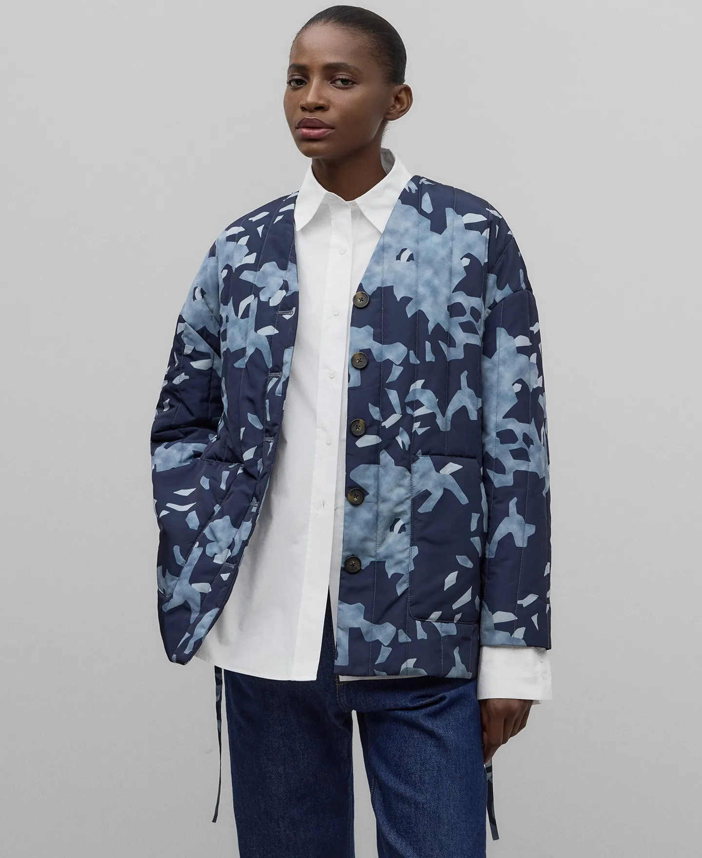 Quilted jacket with scarf woman